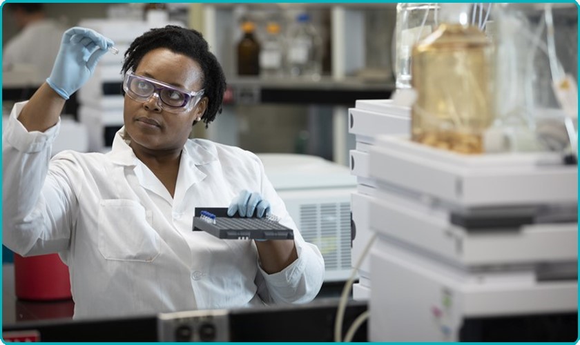 laboratory worker inspects plasma