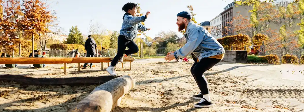 Father and son playing outside