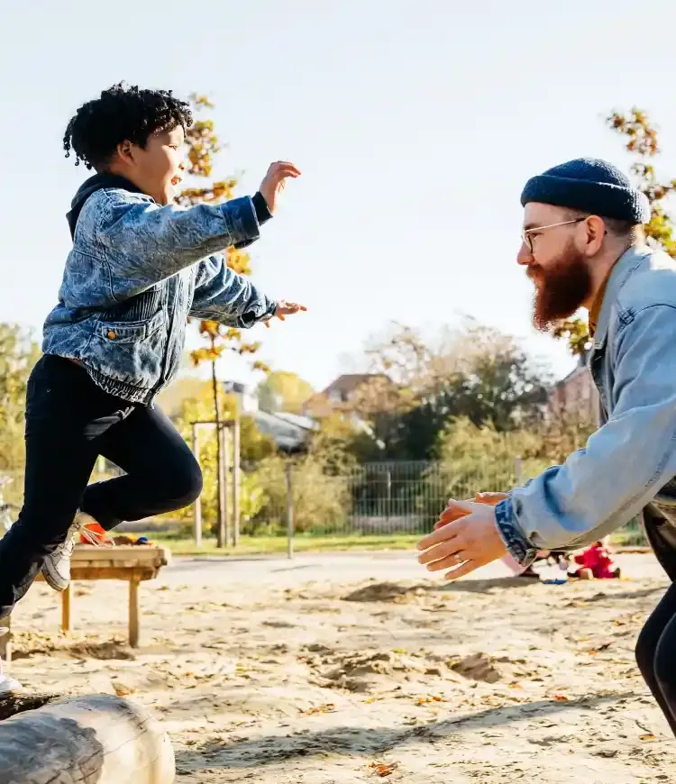 Father and son playing outside